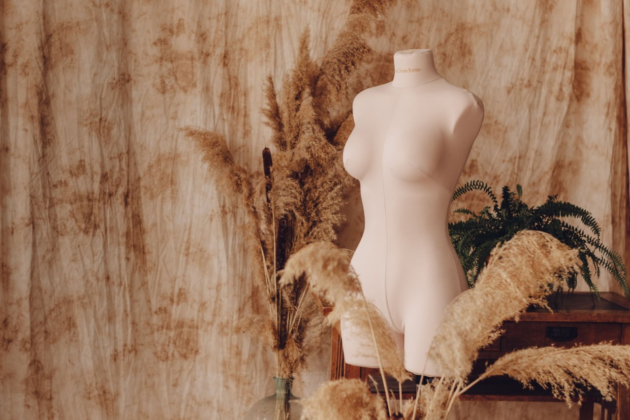 Adorable Penelope mannequin with golden wheat accents